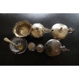 Eight items of silver condiment holders.