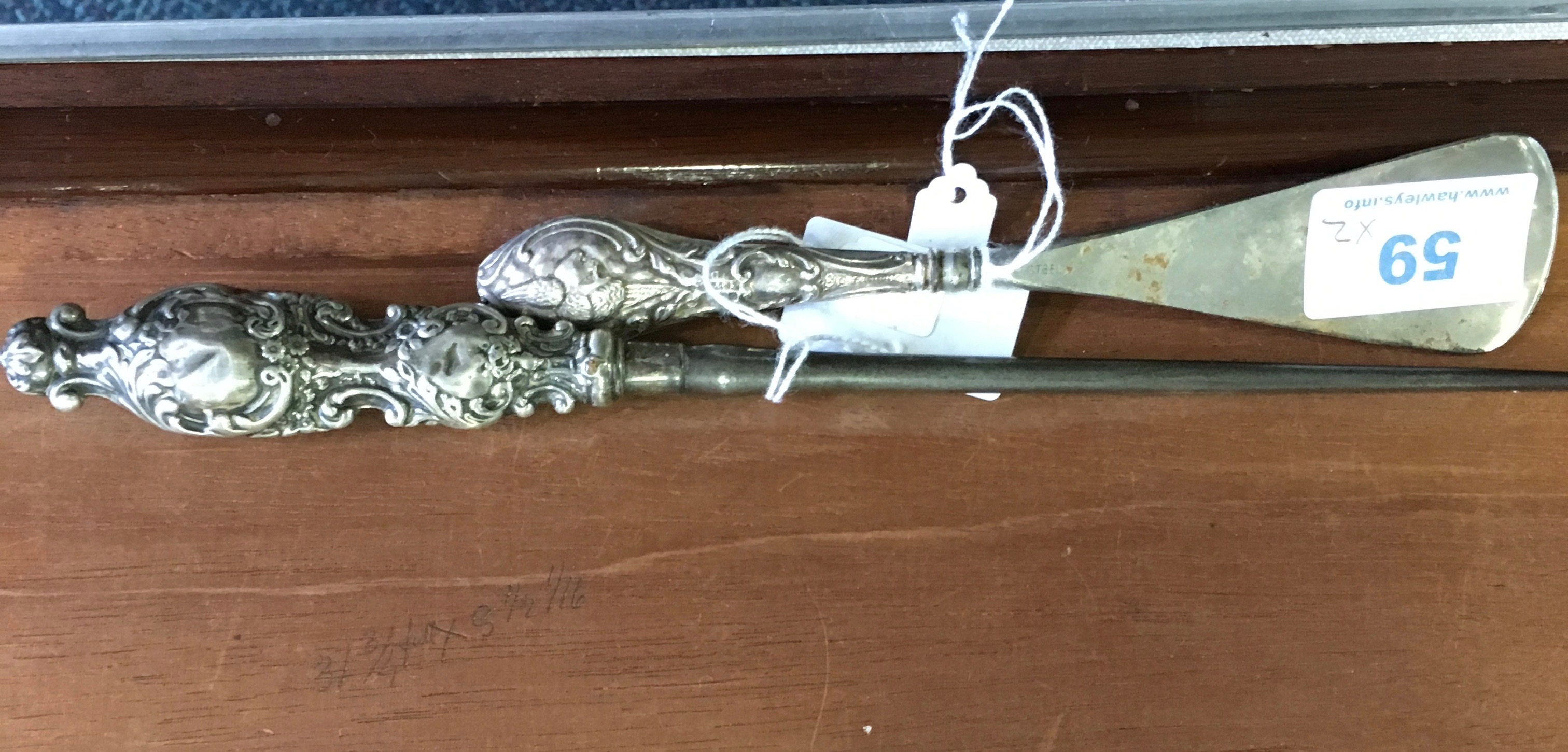 Silver handled boothook and shoe horn.