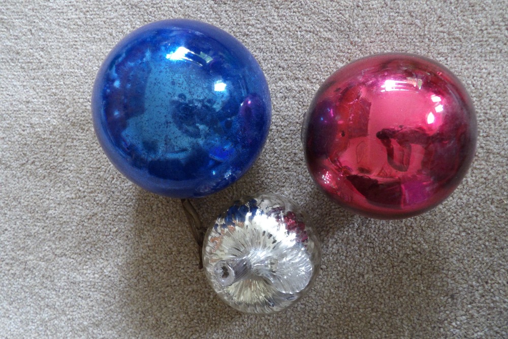 Two coloured witch balls.