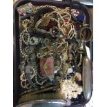 A large quantity of vintage costume jewellery.