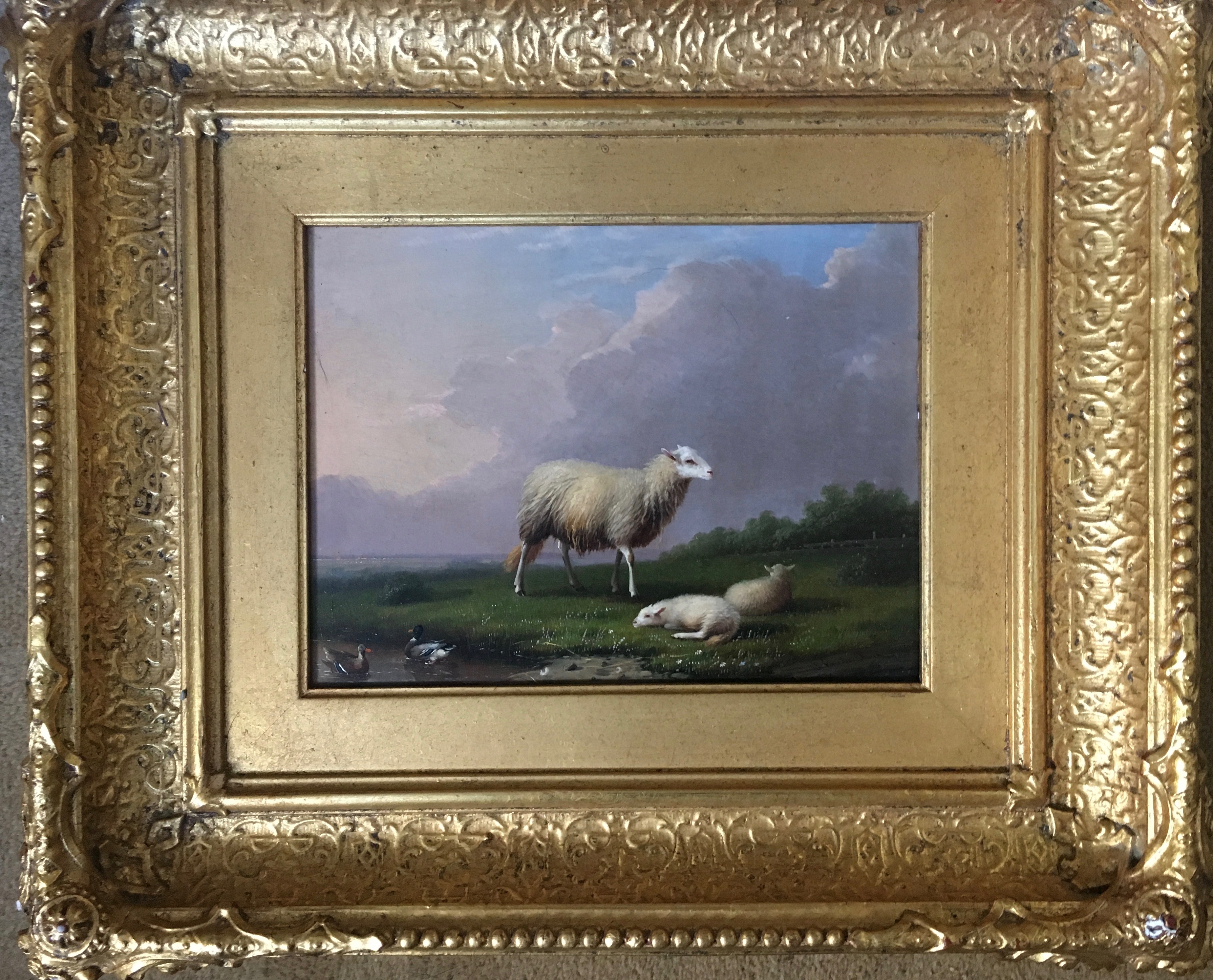 Good quality 19th c oil on board of sheep in a landscape signed lr in the manner of Eugene