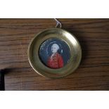 Round portrait miniature of a gentleman in red coat a/f. 5.8cms.