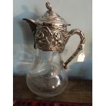 Art Nouveau claret jug with iris motif decoration.