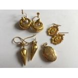 Three pairs of earrings and a locket to include 9carat gold.