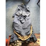 Two piece 19thc silk costume with bustle to skirt, slight a/f to fabric in places.