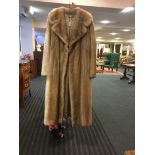 Good quality blond mink coat, pale stripe down one side.