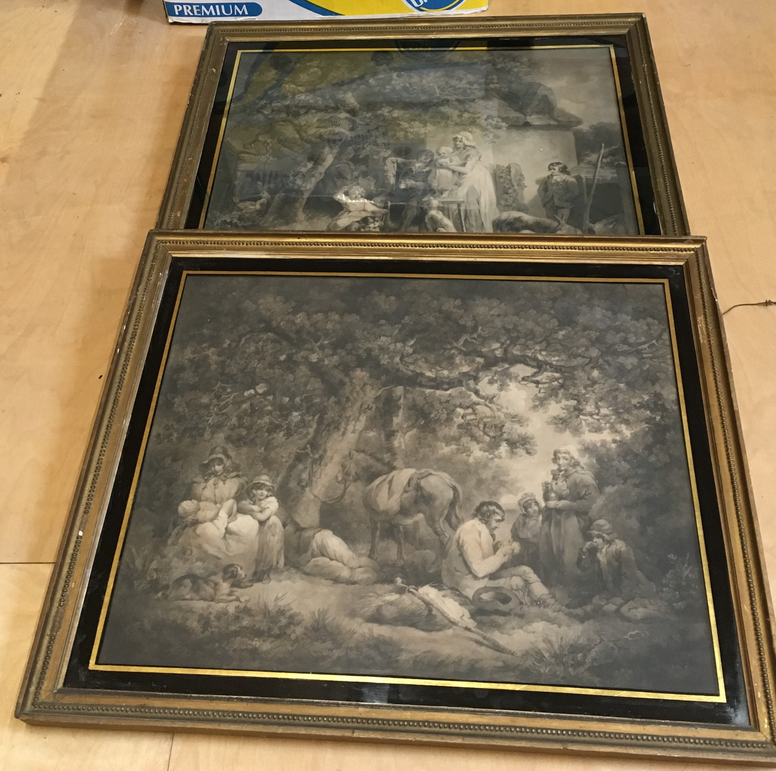 two prints after G. Morland in verre eglomise frames, 48x61cms.
