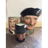 Three Royal Doulton Toby jugs.