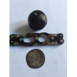 Unusual folding penknife, token and ebony ball.