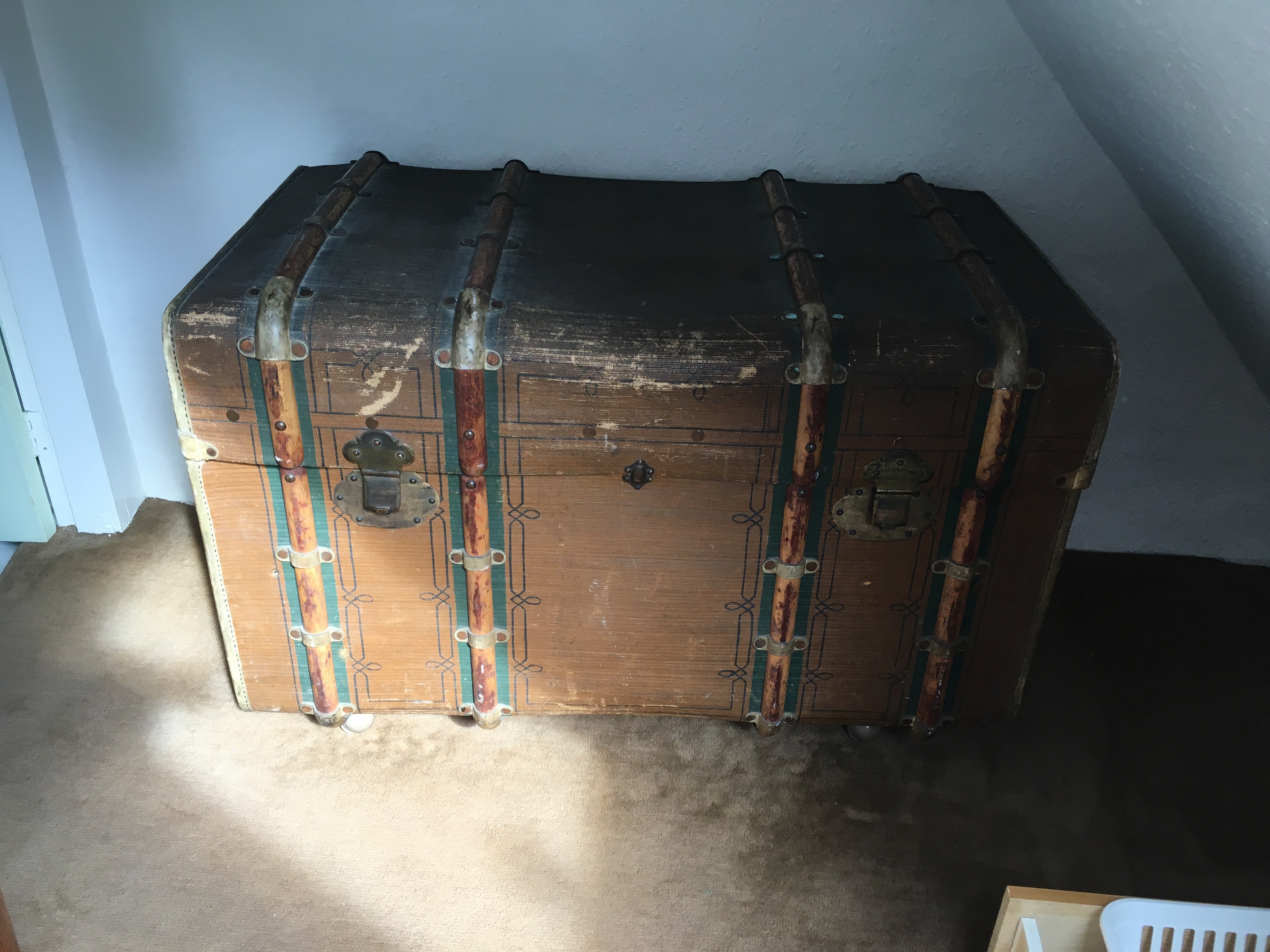 Wood bound canvas travelling trunk 97cms wide.