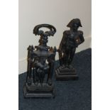 A cast iron doorstop in the form of Admiral Lord Nelson, 41cm high, and another of a Knight standing