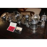 A pair of Victorian silver plated entree dishes (one without handle) two cake baskets, toast rack,