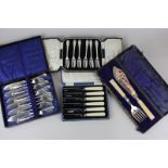 Four cased sets of silver plated flatware including fish knives and forks, fish servers, cake