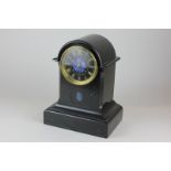 A Victorian black slate mantel clock by John Campbell with eight day Parisian movement, the dial and
