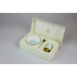 David Andersen (20th century), a silver gilt and white enamel set of salt shaker, dish and spoon,