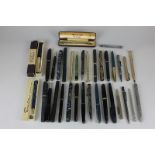 An assortment of various fountain and ball pens and mechanical pencils, to include Esterbrook,