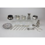 A Victorian silver bonbon dish, a matched part silver cruet with two mustards, a salt and two pepper