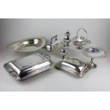 A silver plated rectangular entree dish with clear glass liner, an embossed butter dish with cover