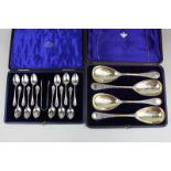 A cased set of twelve silver plated teaspoons and sugar tongs, by James Weir, Glasgow, together with