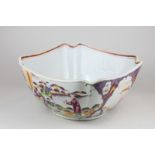 A Chinese famille rose porcelain bowl, square form with shaped corners, decorated with panels of