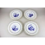 A set of four Minton porcelain cabinet plates with blue transfer printed classical decoration of