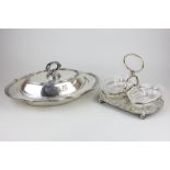 A silver plated oval entree dish monogrammed, together with a silver plated table centre with two