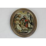 A 19th century painting on oval glass of the nativity scene, in gilt frame 8cm by 9.5cm