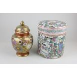 A Chinese famille rose porcelain cylindrical pot and cover, 16cm high, and a Japanese satsuma vase