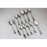 A set of four Victorian silver fiddle pattern teaspoons, and a matched teaspoon, two dessert spoons,