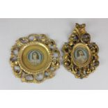 Two 17th century style miniature embroidery portraits of a man and a woman in Rococo style, gilt