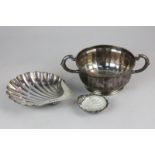 An Edwardian silver shell shaped dish, maker HA, Sheffield, 1901, a George V silver two handled