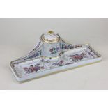 A Paris porcelain desk stand with pale blue ground and Chinese style floral decoration with gilt