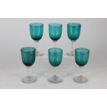 A set of six Victorian green glass port glasses with clear stems
