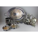 A two handled silver plated oval tea tray together with a coffee pot, egg warmer,a pair of wine