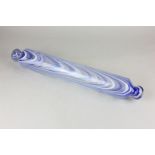 A 19th century glass rolling pin with blue and white line decoration 43cm