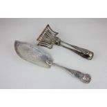 A George IV silver fish slice, maker William Chawner II, London 1826, and a George V silver