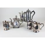 A silver plated teapot, three silver plated mugs (inscribed) and two silver plated jugs