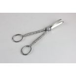A pair of silver plated grape scissors with ball handles
