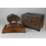 A Chinese carved camphorwood small rectangular chest, an Art Deco style cigarette box with curved