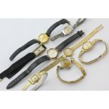 A lady's 9ct wrist watch; a 9ct gold bracelet watch by Accurist; two gold wrist watches on gilt