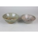 Two Chinese pottery bowls, one with label stating Sung Dynasty, 12th century, the other with