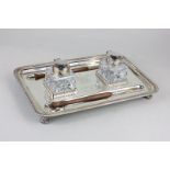 A Mappin & Webb silver plated commemorative desk stand with two inkwells, and quills, bearing