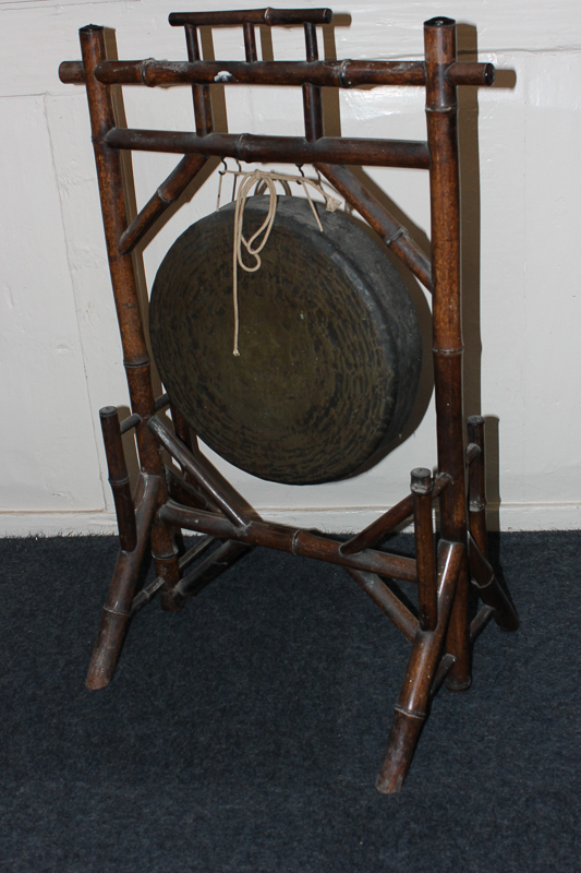A Victorian dinner gong on bamboo stand, 55cm wide (NC)