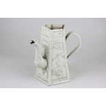 A Chinese creamware jug, hexagonal tapering form, decorated with moulded panels of birds and