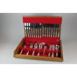 A silver plated canteen for eight (only seven small forks) marked community in a fitted beach case