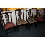 A pair of George III ribbon slat dining chairs, and another two similar single chairs