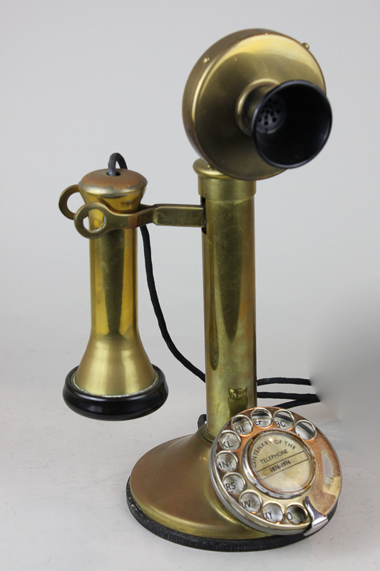 A 1976 telephone to commemorate the centenary of the telephone 1876-1976, in brass vintage style