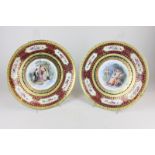 A pair of 19th century Vienna porcelain cabinet plates, hand painted central design of classical