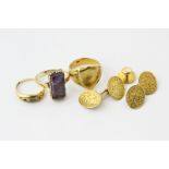 A pair of 15ct gold cuff links, an 18ct gold stud, a gold signet ring and two gem set rings