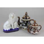Two miniature Bargeware teapots and a Staffordshire pottery spaniel group